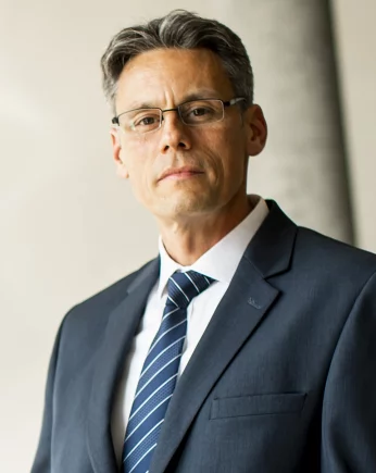 handsome-businessman-using-his-tablet-in-the-offic-2026-01-08-05-42-26-utc-small