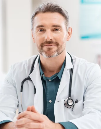 portrait-of-a-mature-doctor-working-in-a-medical-o-2026-01-09-09-17-46-utc-small