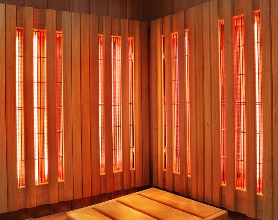 Interior of Finnish sauna, infrared panels for medical procedures, classic wooden sauna