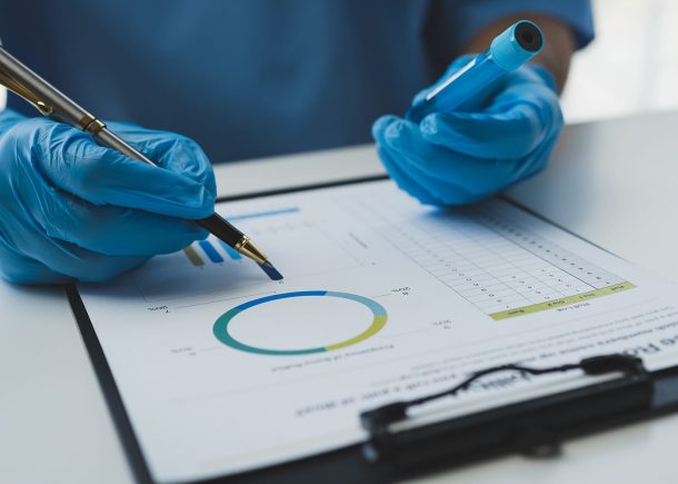 Scientist working with a microscope Laboratory team doing medical research Scientific test tubes in the laboratory for analyzing data in the lab Biological concept, insurance.