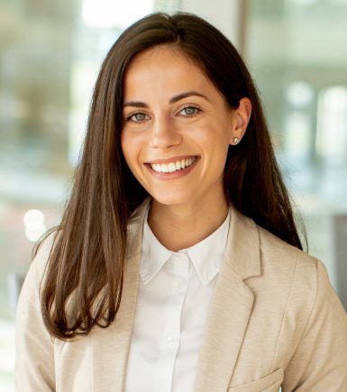 Pretty young woman with digital tablet in the office